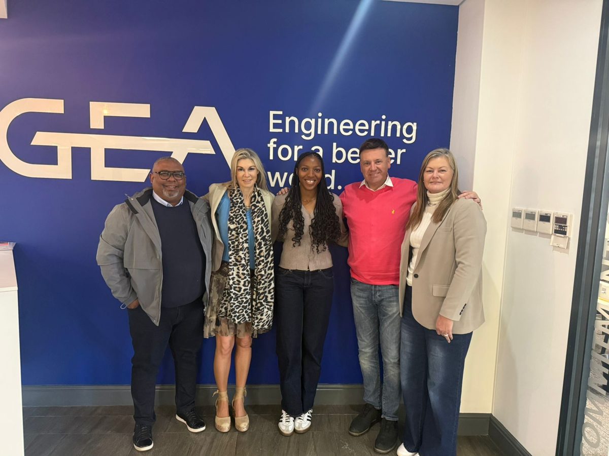 Entle Futshane, Dr Freda Kemp and GEA and FNB representatives standing in front of the GEA wall